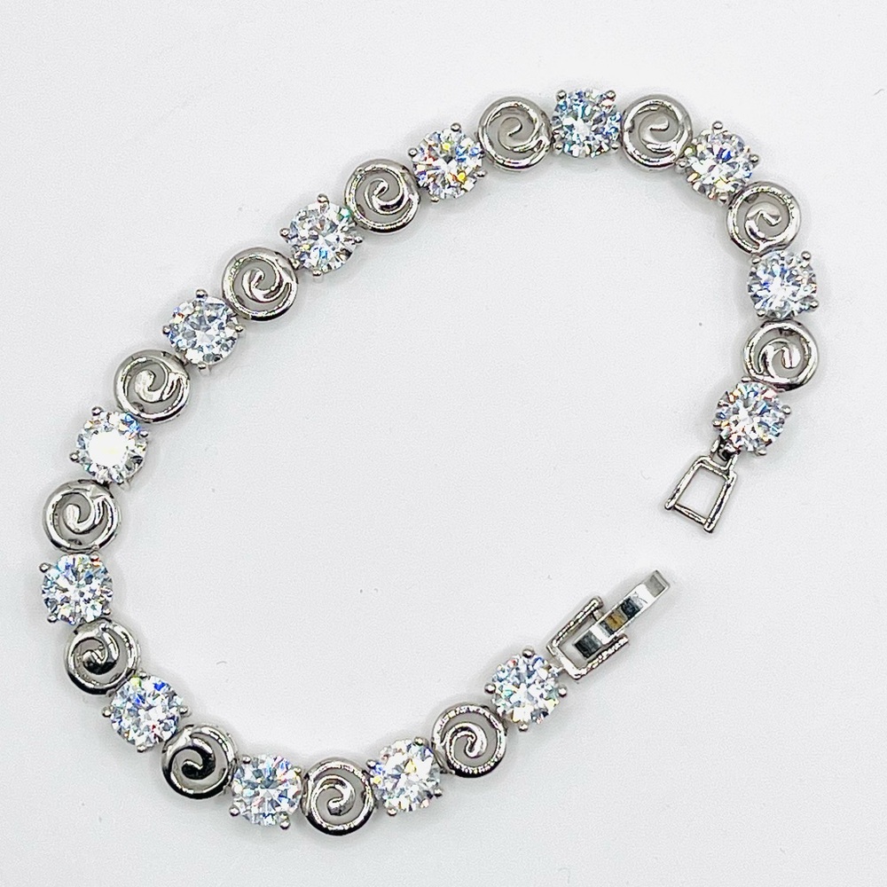 Premium Platinum Finish Swirl Bracelet with Quality AAA+ CZ Simulated Diamonds